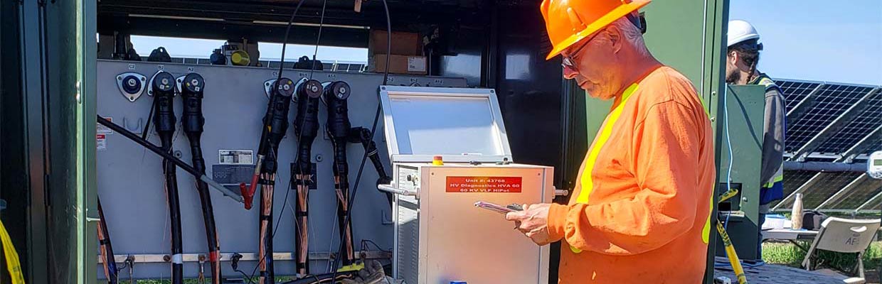 About Us header image - Bruce at open electrical box